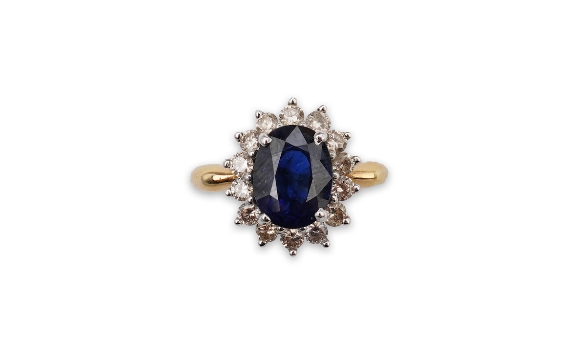 A sapphire and diamond cluster ring